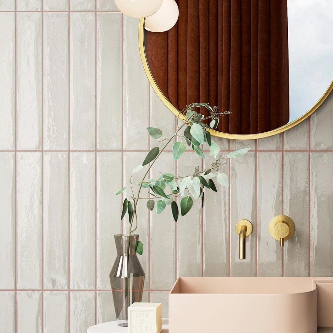 Blush grout and a blush vessel sink for bathroom