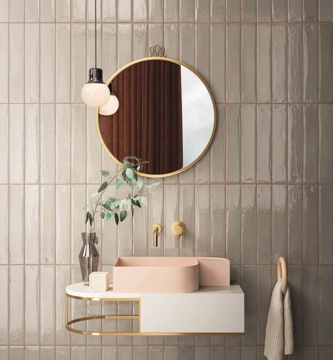 Pink grout and greige tile for bathroom