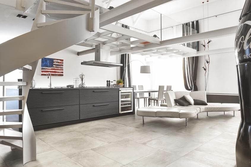 living room in apartment with industrial chic tile flooring