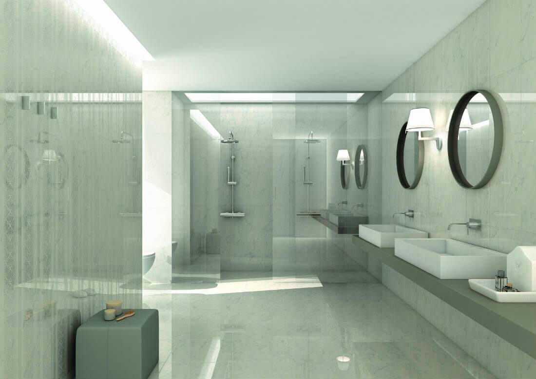 Spacious bathroom with white marble-look tiles with a glossy finish