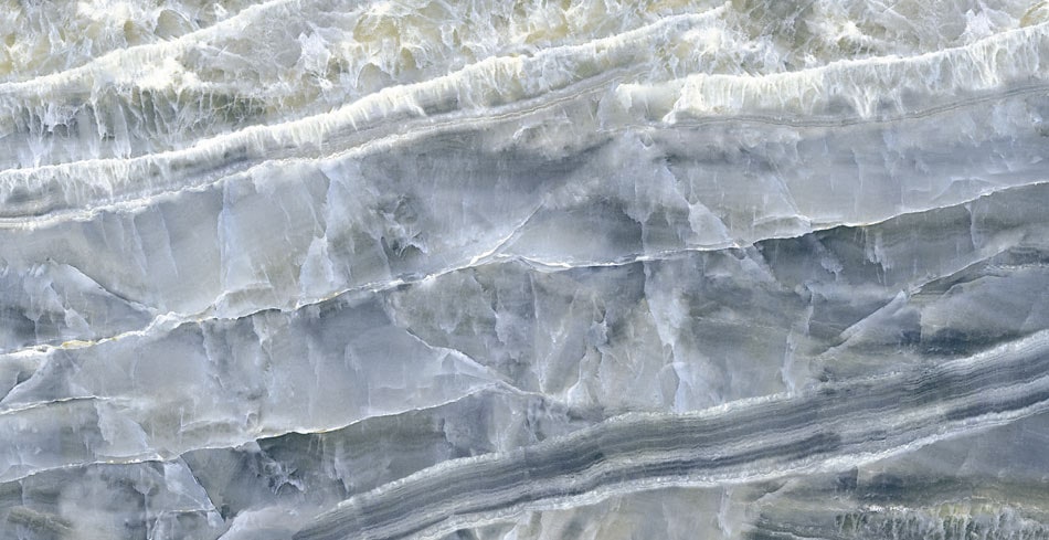 Onyx-look porcelain tile with semi-translucent layers, showcasing organic green and neutral tones with stunning depth